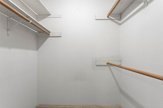 View of spacious closet | Image 26