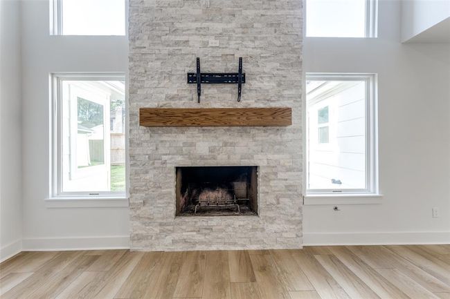 Stone fire place with electrical outlet for mounting your TV | Image 10