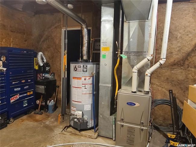Utility room featuring water heater | Image 27