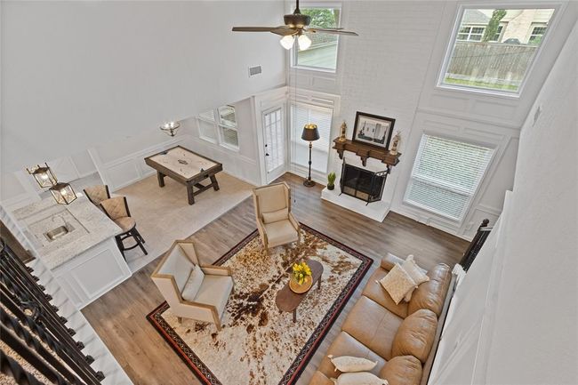View of family room and breakfast area from upstairs. | Image 33