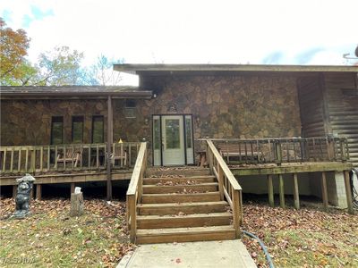 Back of property featuring a deck | Image 2