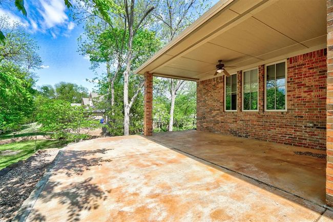 View of patio / terrace featuring a carport and a ceiling fan | Image 44