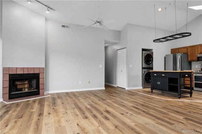 living room with fireplace | Image 23