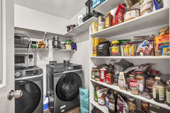 Laundry room with pantry shelving | Image 19