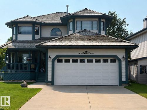7 Country Club Dr, House with 5 bedrooms, 4 bathrooms and null parking in Beaumont AB | Card Image