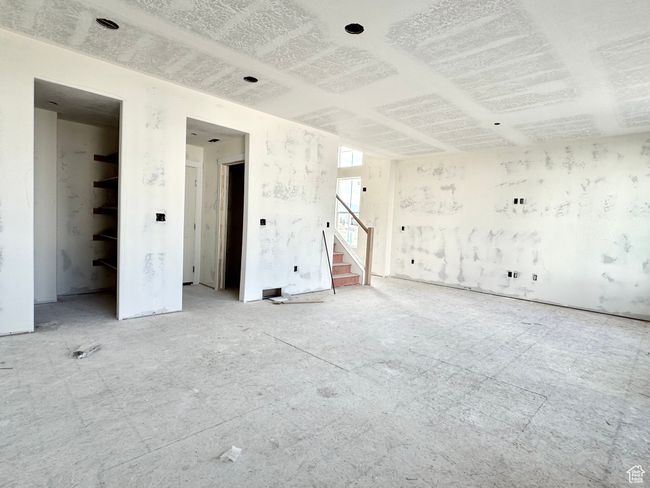 Empty room featuring stairway | Image 4