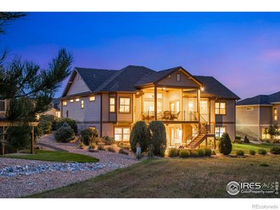 Welcome Home! Appealing deck and patio with mountain views awaits you! | Image 1