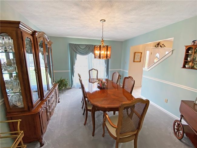 The dining room is extended two feet to make entertaining easy. | Image 6