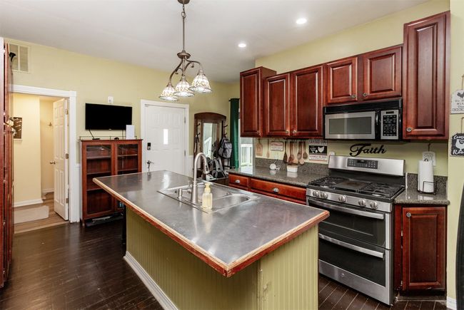 5825 G24 Hwy, Home with 7 bedrooms, 4 bathrooms and null parking in Carlisle IA | Image 8