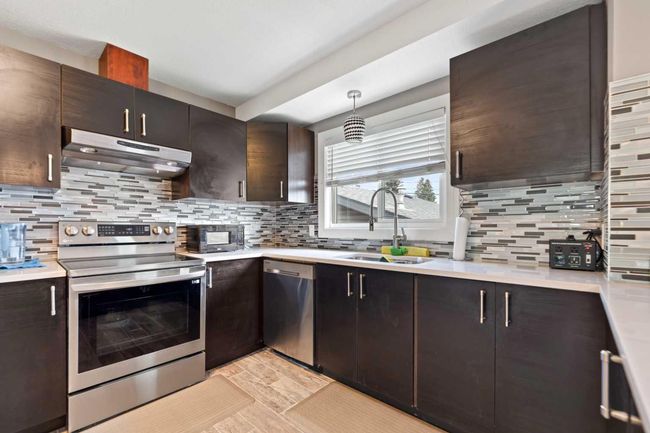 83 Penmeadows Place Se, House other with 4 bedrooms, 2 bathrooms and 2 parking in Calgary AB | Image 13