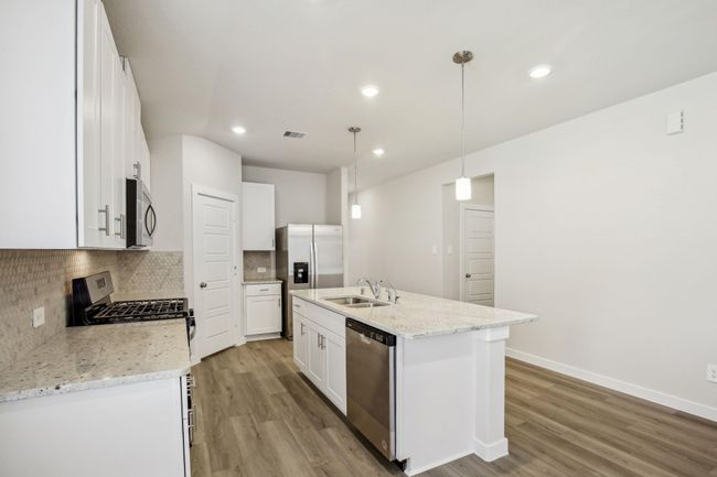 Photo is not of the actual home but is an inspirational photo of builder’s model home and may depict options, furnishings, and/or decorator features that are not included. | Image 4