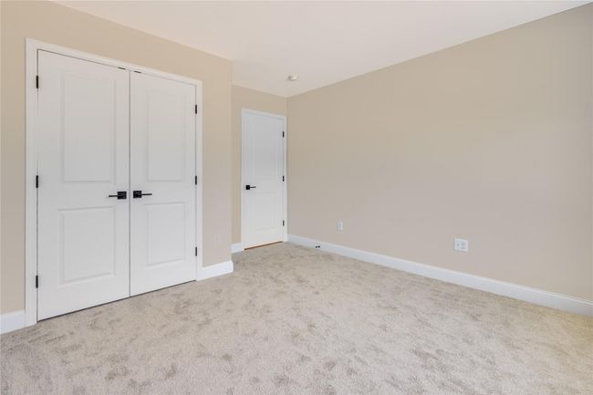 Unfurnished room with carpet, baseboards, and ceiling fan | Image 30