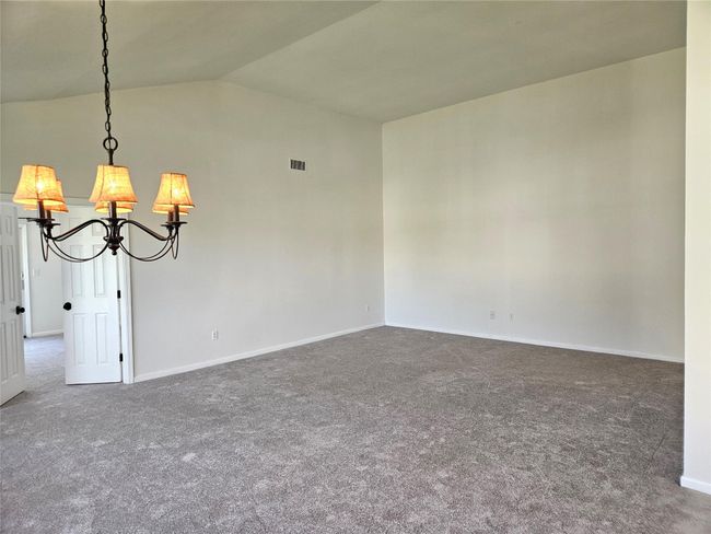 The Living Room Section Of The Great Room Offers Beautiful Soaring Ceilings, All New Neutral Carpeting, And Ample Room For A Large Sized Living Room Set/Furniture. | Image 7
