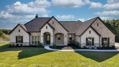 French country home with a front lawn | Image 2