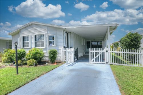 1109 Tequesta Dr, Barefoot Bay, FL, 32976-7042 | Card Image