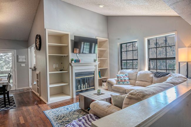 2nd floor living space. WB Fireplace and bookshelves | Image 6