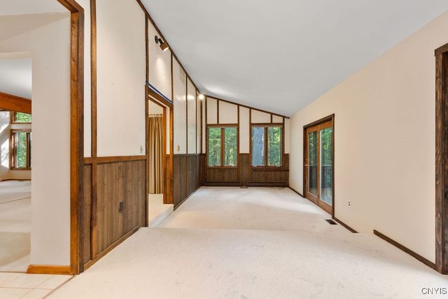 Living room features vaulted ceilings! | Image 17