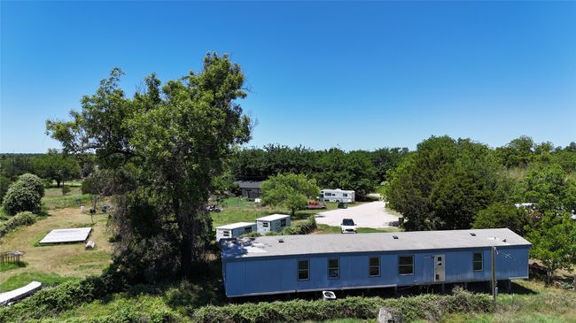 7077 Aztec Trl, House other with 3 bedrooms, 2 bathrooms and null parking in Weatherford TX | Image 4