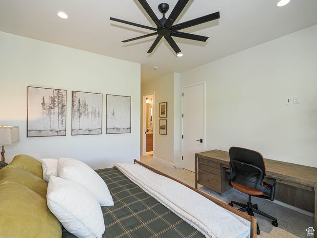 Carpeted bedroom featuring recessed lighting, a desk, and a ceiling fan | Image 82