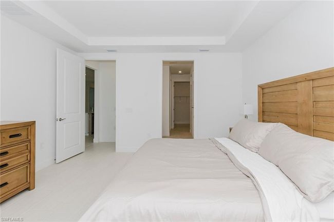 Bedroom with a raised ceiling | Image 20