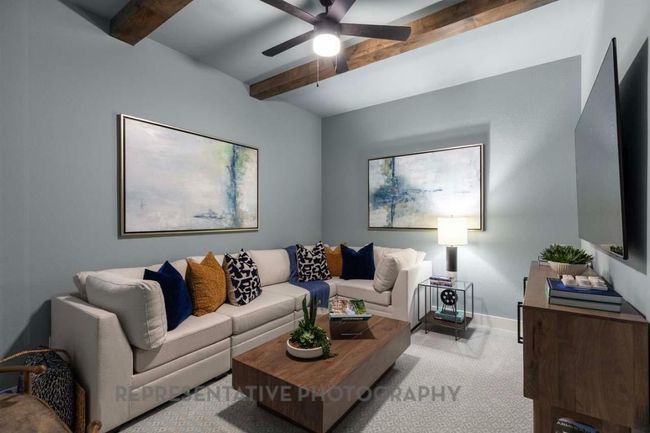 Living area featuring beamed ceiling, carpet, and ceiling fan | Image 35
