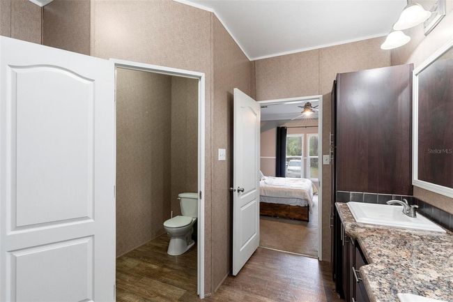 Private water closet in primary bathroom | Image 20