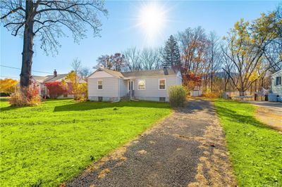 Single story home with a front yard | Image 1