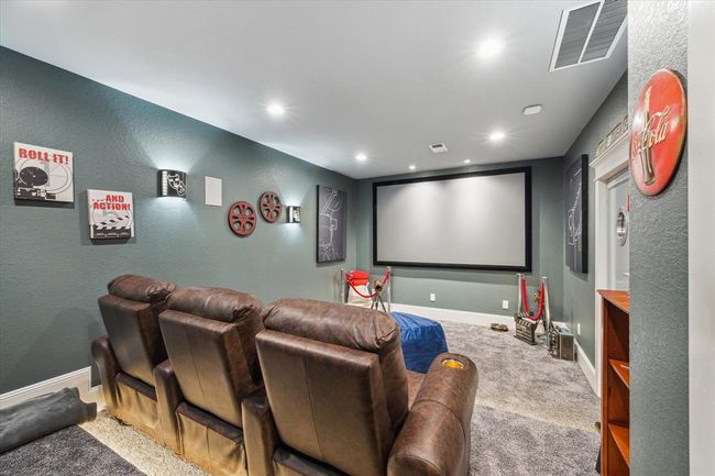 The movie room is the perfect blend of comfort and relaxation. The room’s layout makes it feel intimate yet spacious, creating an inviting atmosphere for long movie marathons or casual watching. It’s a space designed to keep you comfortable for hours of enjoyment. | Image 29
