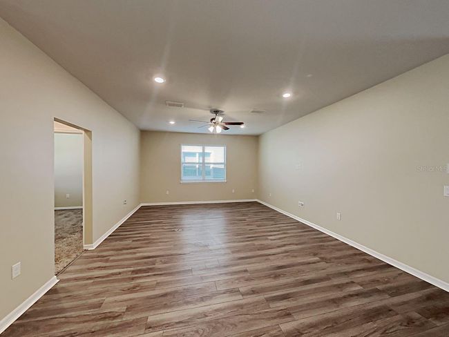 7603 Pool Compass Loop, House other with 4 bedrooms, 3 bathrooms and null parking in Wesley Chapel FL | Image 4