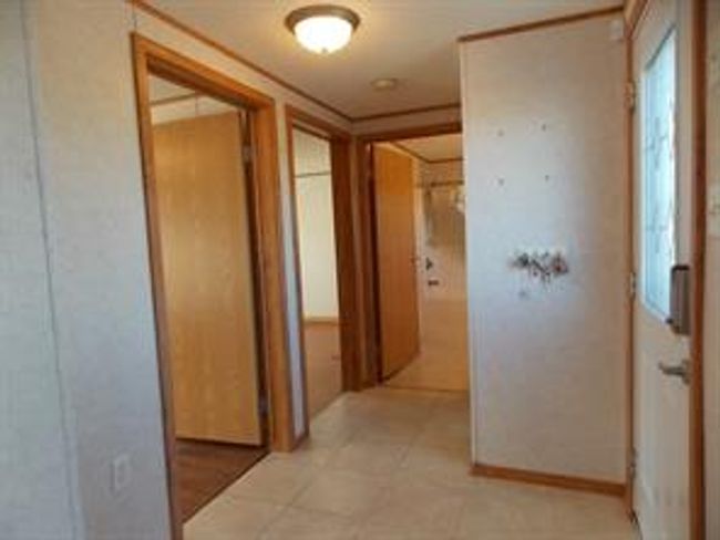 77 - 5210 65 Ave, Home with 3 bedrooms, 2 bathrooms and 3 parking in Olds AB | Image 27