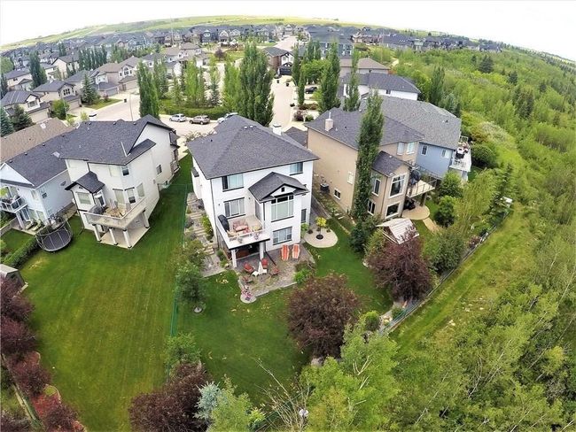 16 Valley Crest Gardens Nw, Home with 4 bedrooms, 3 bathrooms and 4 parking in Calgary AB | Image 2