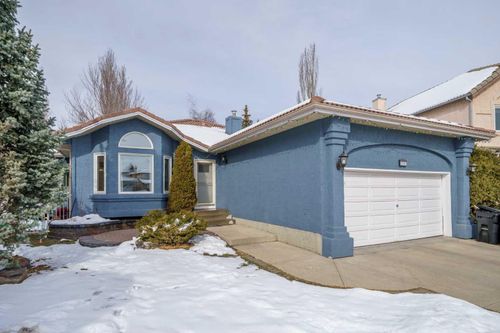 256 Sirocco Place Sw, Home with 4 bedrooms, 3 bathrooms and 4 parking in Calgary AB | Card Image