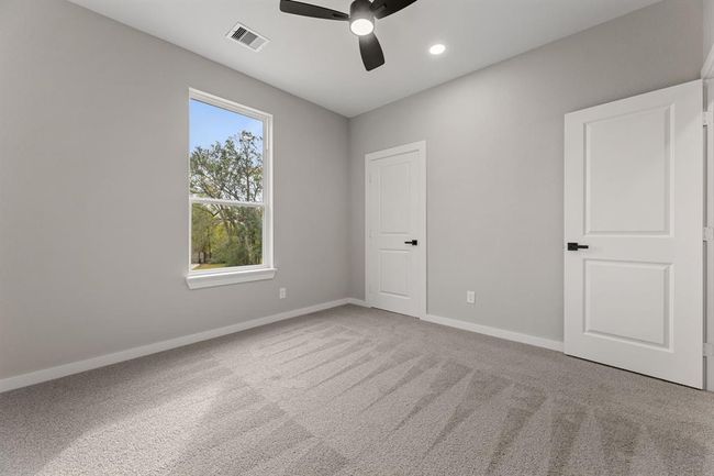 Another view of the first bedroom. A spacious and flexible room ready to be customized to suit your needs. | Image 13