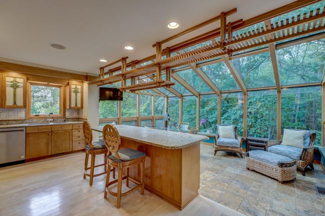 Kitchen with natural cherry cabinets, granite counter tops, sub zero and viking appliances. | Image 15