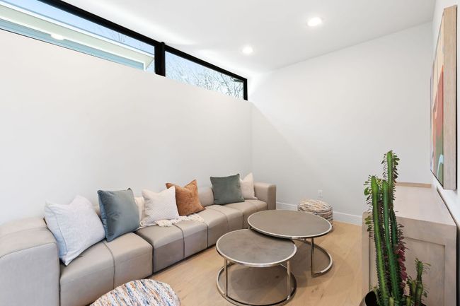 Living room featuring light wood-style flooring, recessed lighting, and baseboards | Image 11