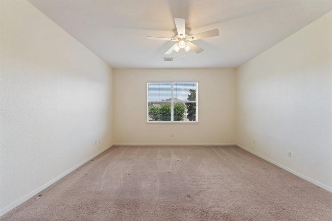 Each secondary bedroom includes one to two spacious closets, providing ample storage for clothes, toys, or extra essentials. | Image 27