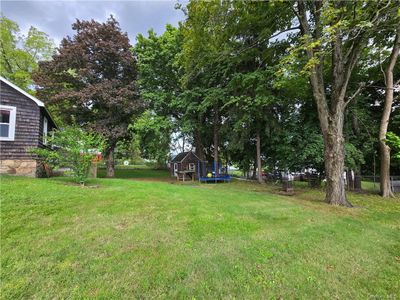 View of yard featuring a trampoline | Image 2