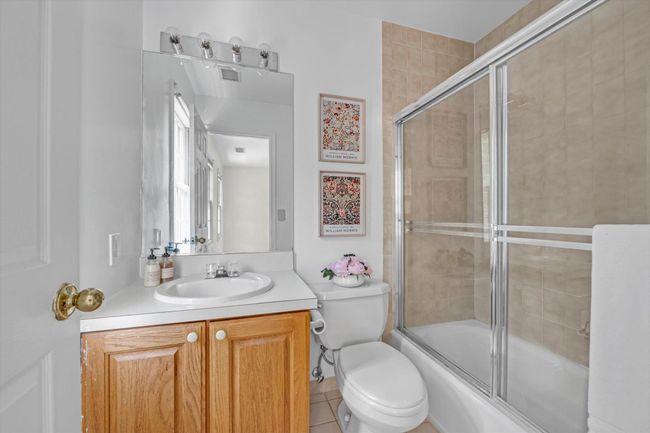 Full bath with vanity and enclosed tub / shower combo | Image 15