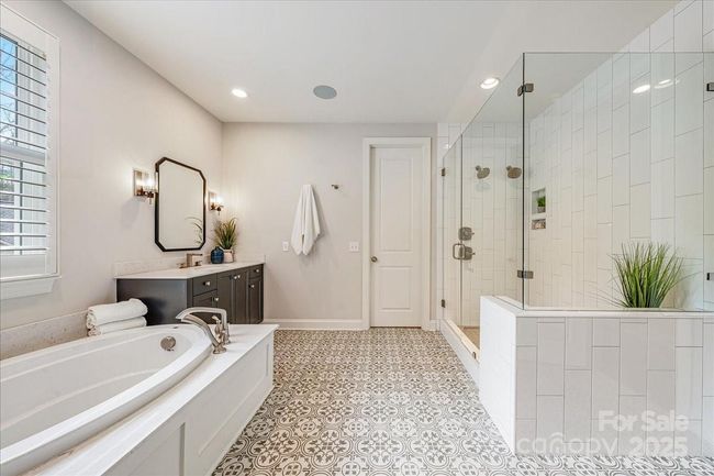 Oversized, stand alone shower with bench with access to your walk-in closet | Image 19