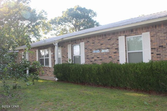6562 Messer Rd, House other with 3 bedrooms, 2 bathrooms and null parking in Grand Ridge FL | Image 4