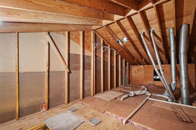 View of unfinished attic | Image 25