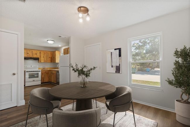 Virtually staged dining area/ kitchen | Image 6
