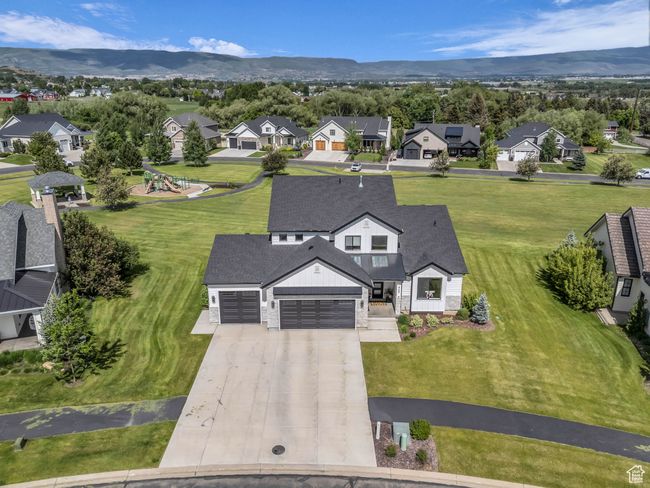 Aerial view of residential area featuring a mountain backdrop | Image 52