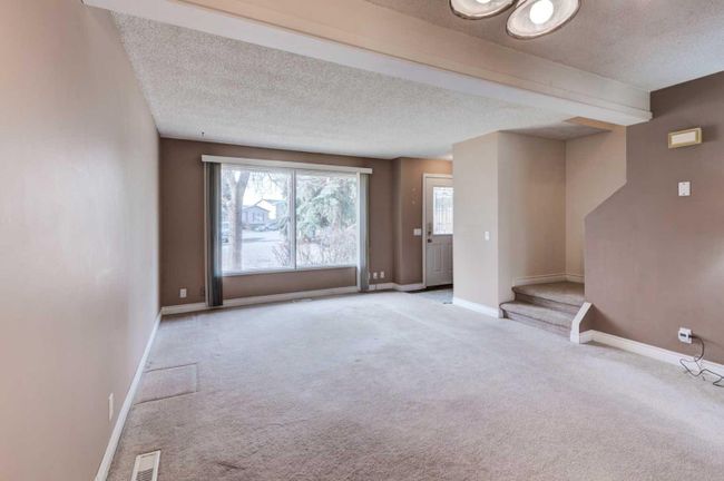 24 Erin Croft Green Se, Home with 3 bedrooms, 1 bathrooms and 2 parking in Calgary AB | Image 8