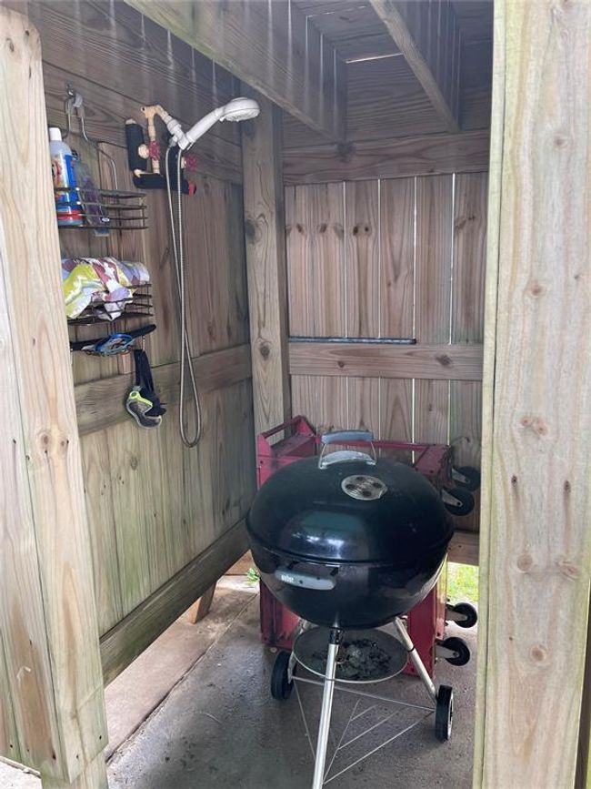 Downstairs shower and storage for the grill. | Image 23