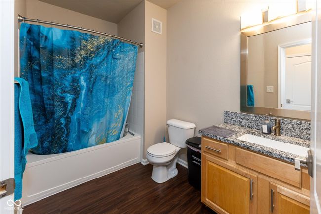 bathroom featuring shower / bath combination, and vanity with enough space for your needs | Image 15