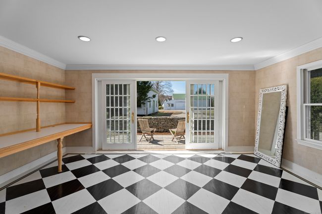 Enjoy this flex space as a dining room or office. | Image 17