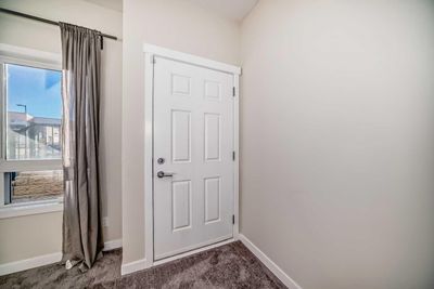 940 Sherwood Blvd Nw, Townhouse with 3 bedrooms, 2 bathrooms and 1 parking in Calgary AB | Image 3