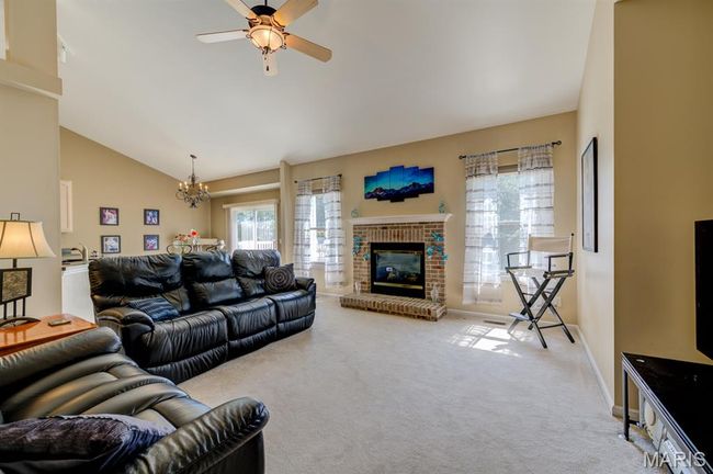 The living room is spacious to accommodate your furniture... | Image 6