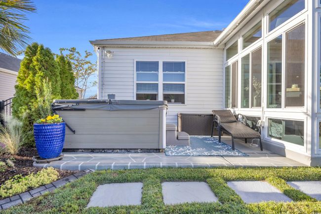 View of patio / terrace with a hot tub | Image 31